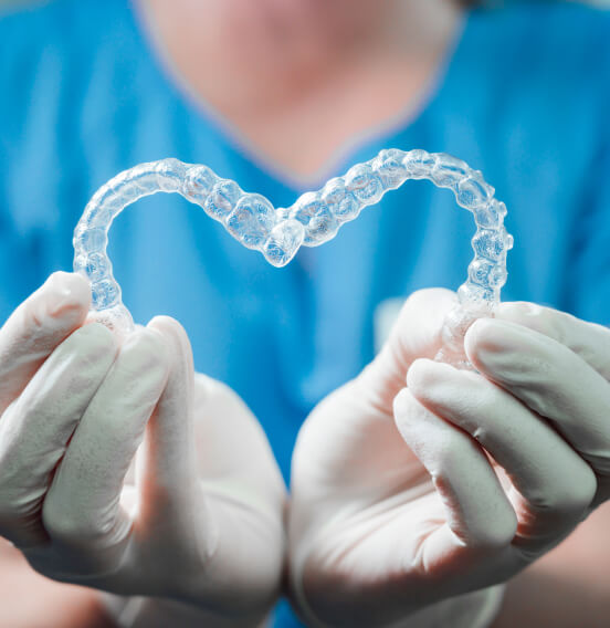 Two Invisalign clear aligners.
