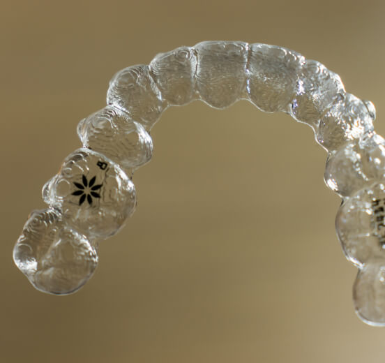 Invisalign clear aligners.
